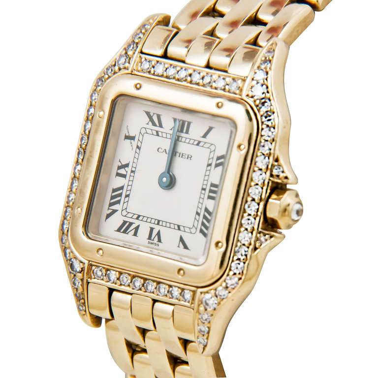 Cartier lady's 18k yellow gold Panther wristwatch, with diamond-set bezel and lugs, diamond-set crown. Quartz movement, deployant clasp. Circa 1990s.