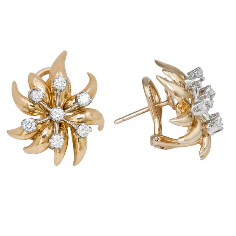 Jean Schlumberger for Tiffany & Company Flame Collection 18K Yellow Gold Ear Clips, set with 1/2 Carat of Fine White Round Brilliant Cut Diamonds. Post with Omega Clip Backs.