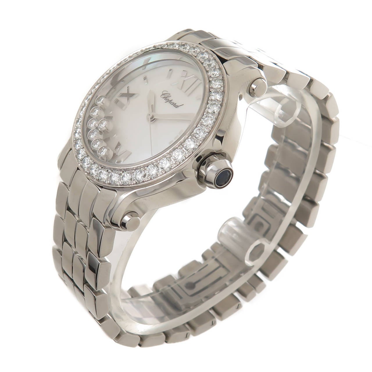 Circa 2005 Chopard Happy Sport Stainless Steel and 7 floating Diamond  Diamond Mid Size Wrist watch, 36MM water proof case with Round Brilliant cut Diamond bezel, Diamonds totaling 1.50 Carat. Sapphire set Crown, Mother of Pearl Dial with raised