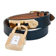 Hermes Lady's Double Wrap Kelly Wristwatch en métal doré circa 2010