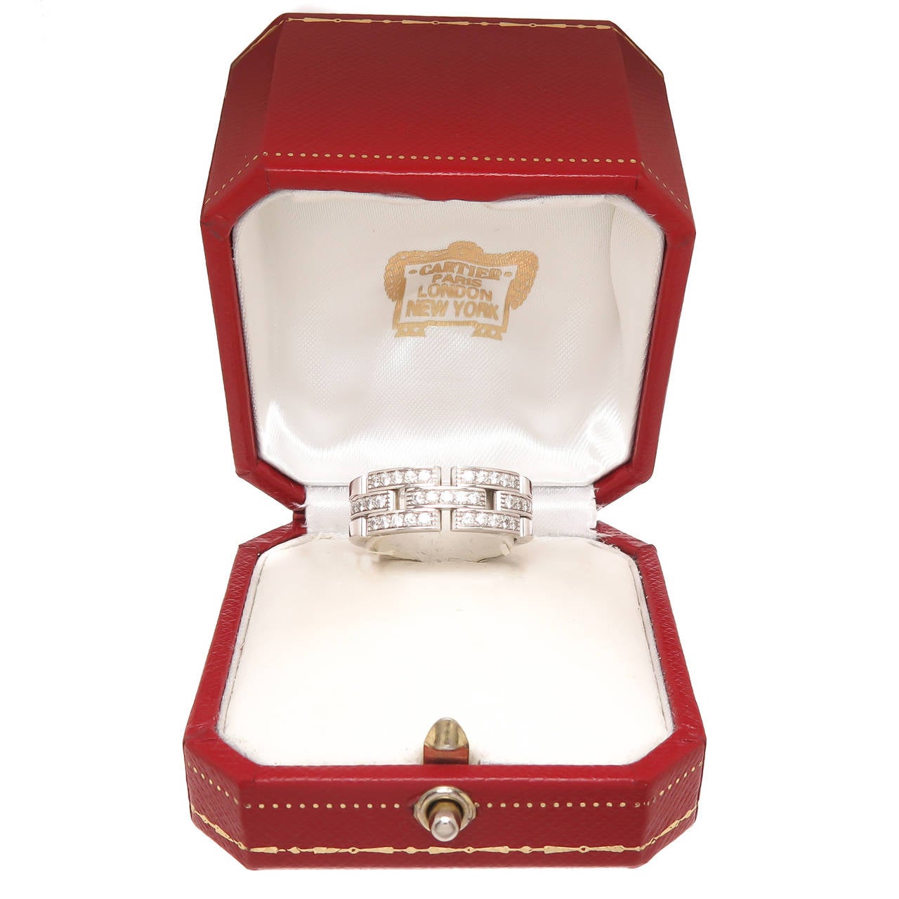 Cartier 18K White Gold and Diamond Ring from the Maillon Panthere De Cartier Collection. containing 35 round brilliant cut Diamonds totaling approximately 1 carat and grading as F-G in color and VVS in Clarity. Measuring 5/16 inch wide. Finger size