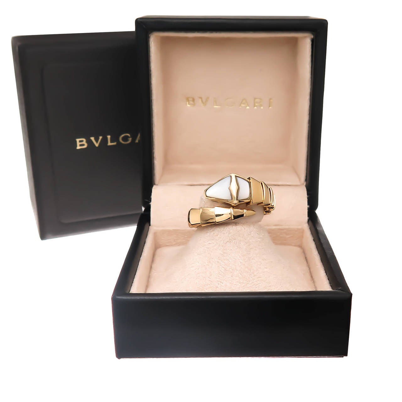 Circa 2014 Bulgari Serpenti Collection Ring, 18K yellow Gold and Mother of Pearl, signed and numbered. This ring is flexible and on the small size is a size 6 1/2 and will easily go up to a size 8. Comes in the original Bulgari Presentation box.