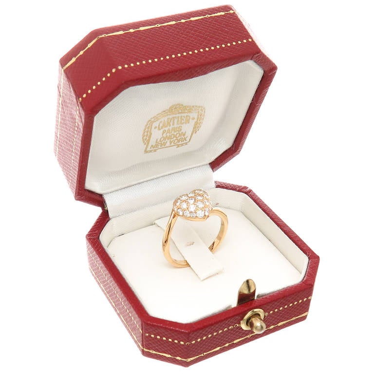 circa 1990 18k Yellow Gold and Diamond pave Heart Ring by Cartier. Set with Round Brilliant cut Diamonds totaling 1 Carat. Signed and Numbered, original Gift box.  Top of ring measures 3/8 X 3/8 Inch, Finger size = 5 1/4.
