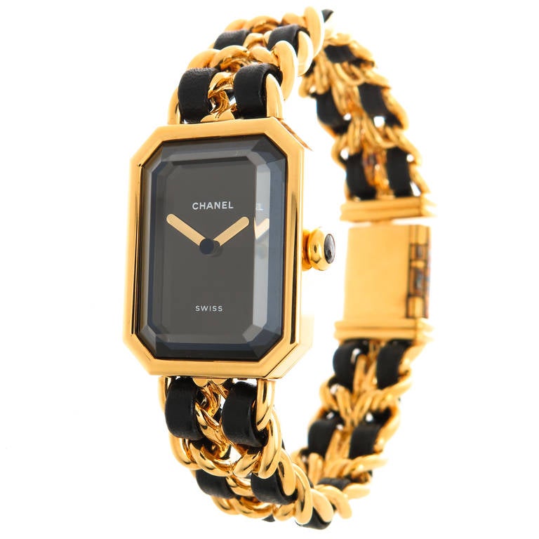 Chanel lady's Premier wristwatch, gold-plate with leather through the bracelet, quartz movement. Circa 1990s.