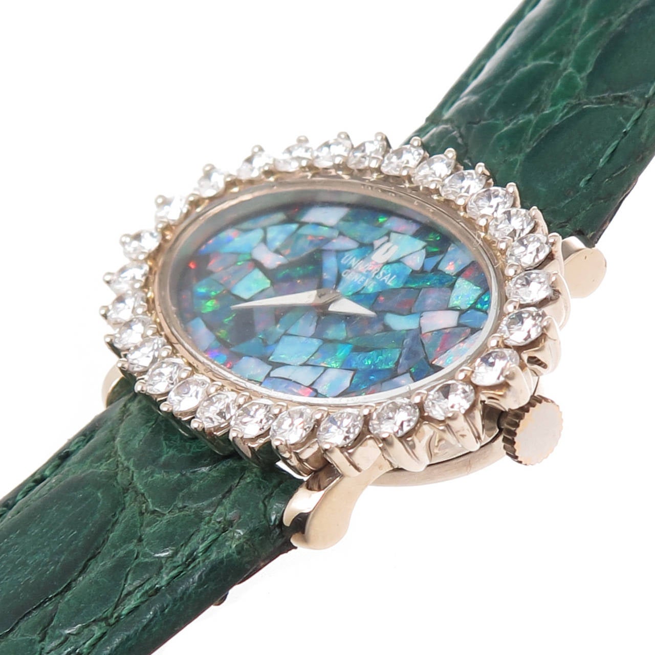 Universal Lady's 18K White Gold Wristwatch set with 28 Round Brilliant-Cut Diamonds Totaling 2.75 Carats that are G in Color and VS in Clarity. Opal Mosaic Dial with Fire, and Black opal having strong Blue, Red and Green Colors. 17-Jewel Manual-Wind