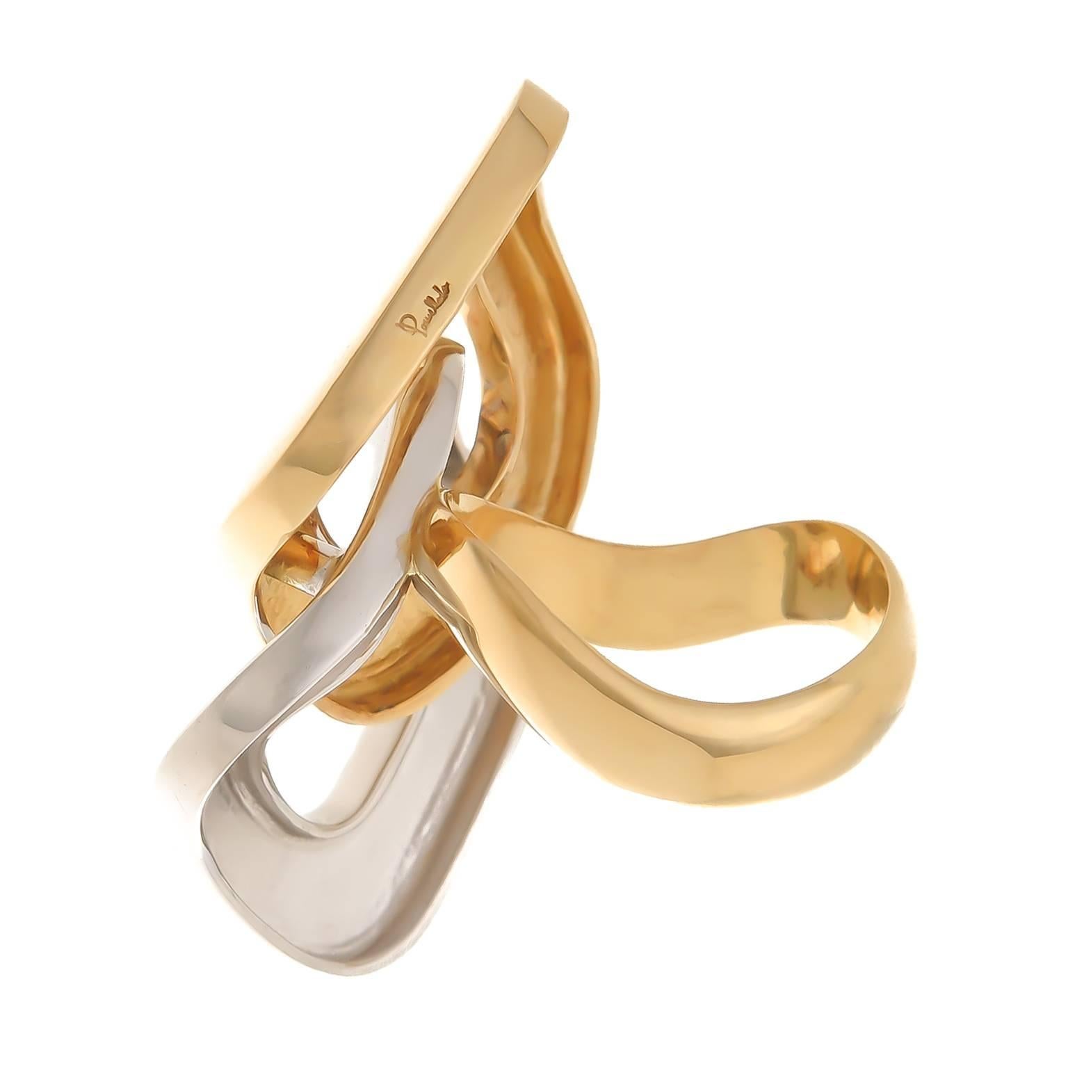 Pomellato 18K White and Yellow Gold ring in an interlocking Cushion link design. Measuring 1 1/2 inch in length and 1 inch wide. Finger size = 5 1/2.