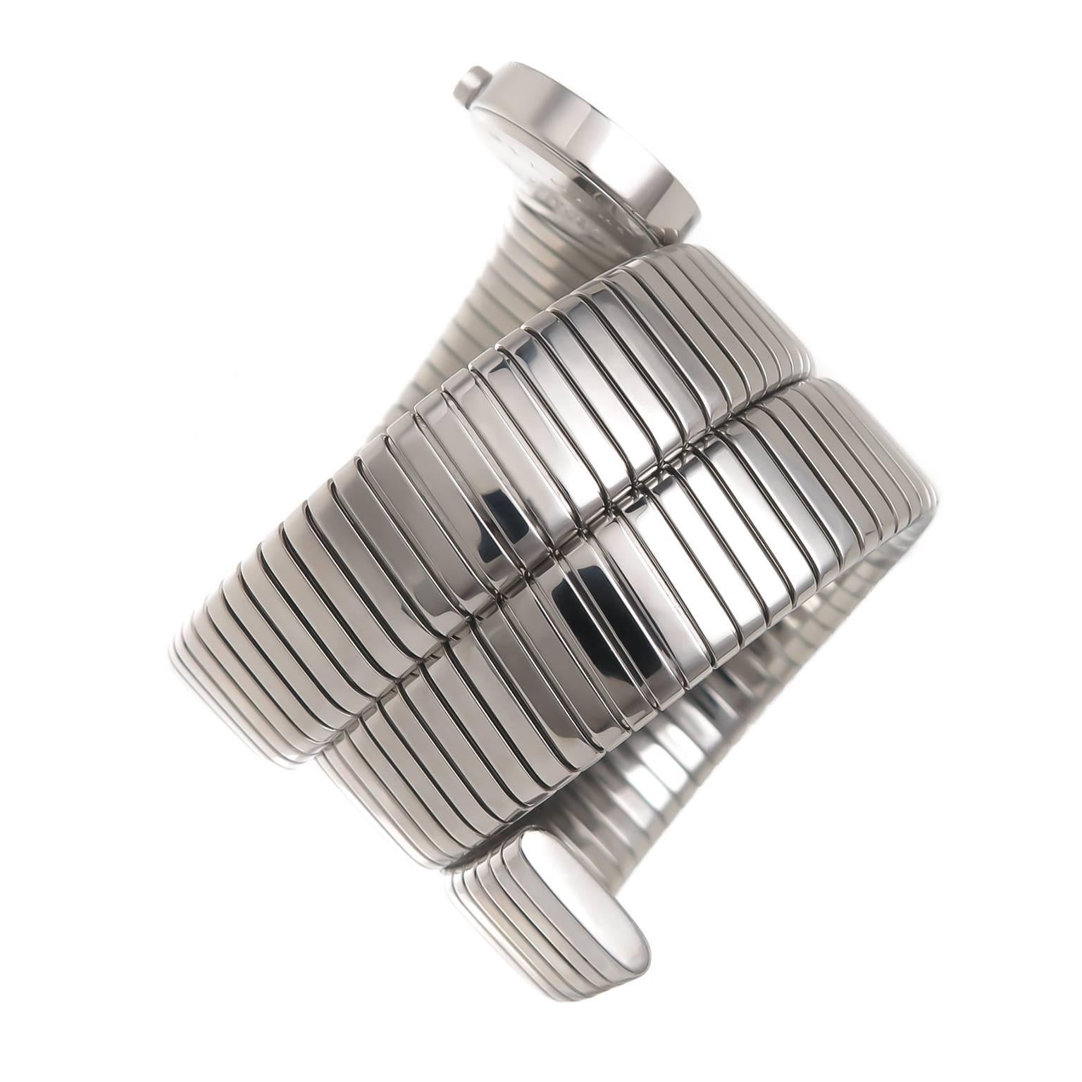 Circa 2010 Bvlgari Serpenti Stainless Steel Snake wrap around bracelet watch. measuring 1 5/8 inch wide and is flexible and will fit a wrist between 5 to 8 inch comfortably. Quartz Movement, water resistant case, scratch resistant crystal and a