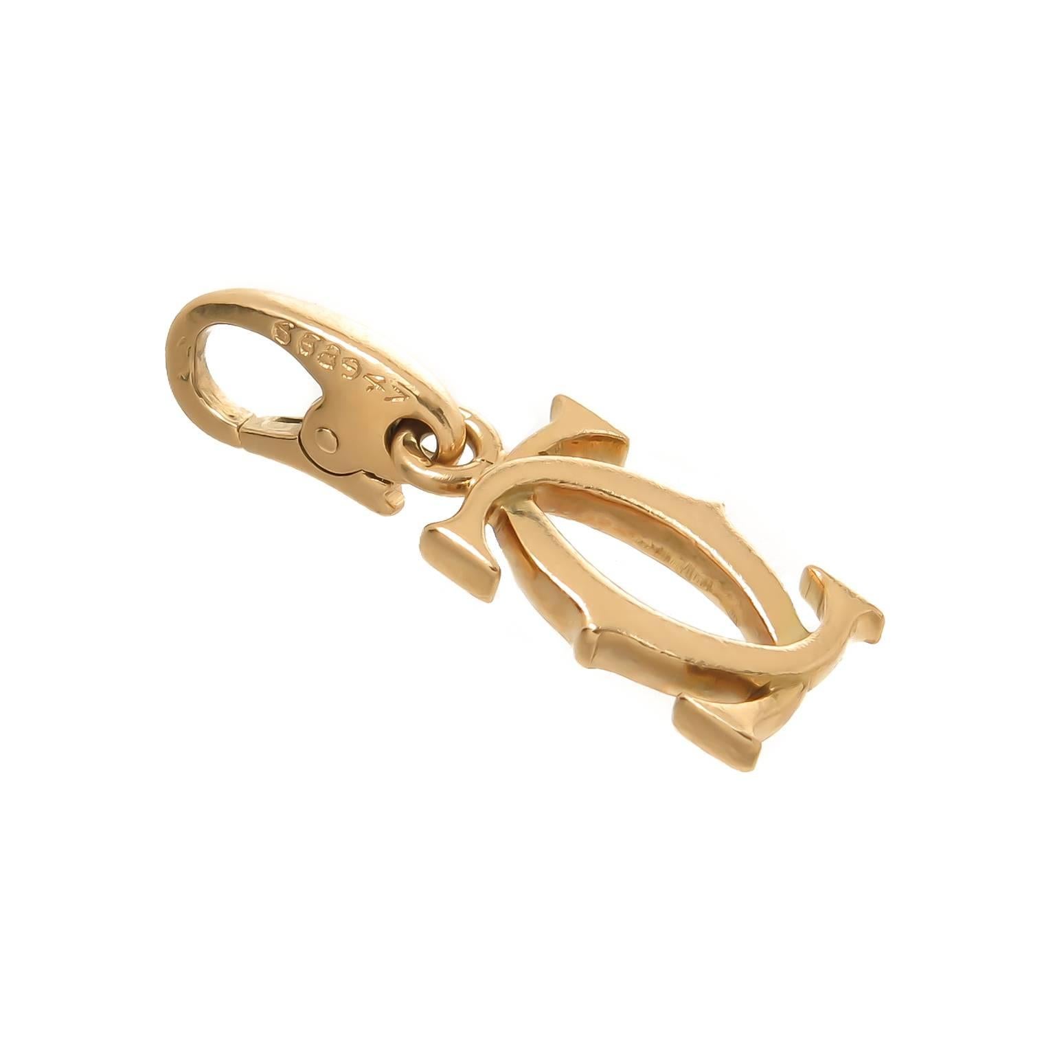 Cartier Gold Doppel CC Charme und Armband Damen