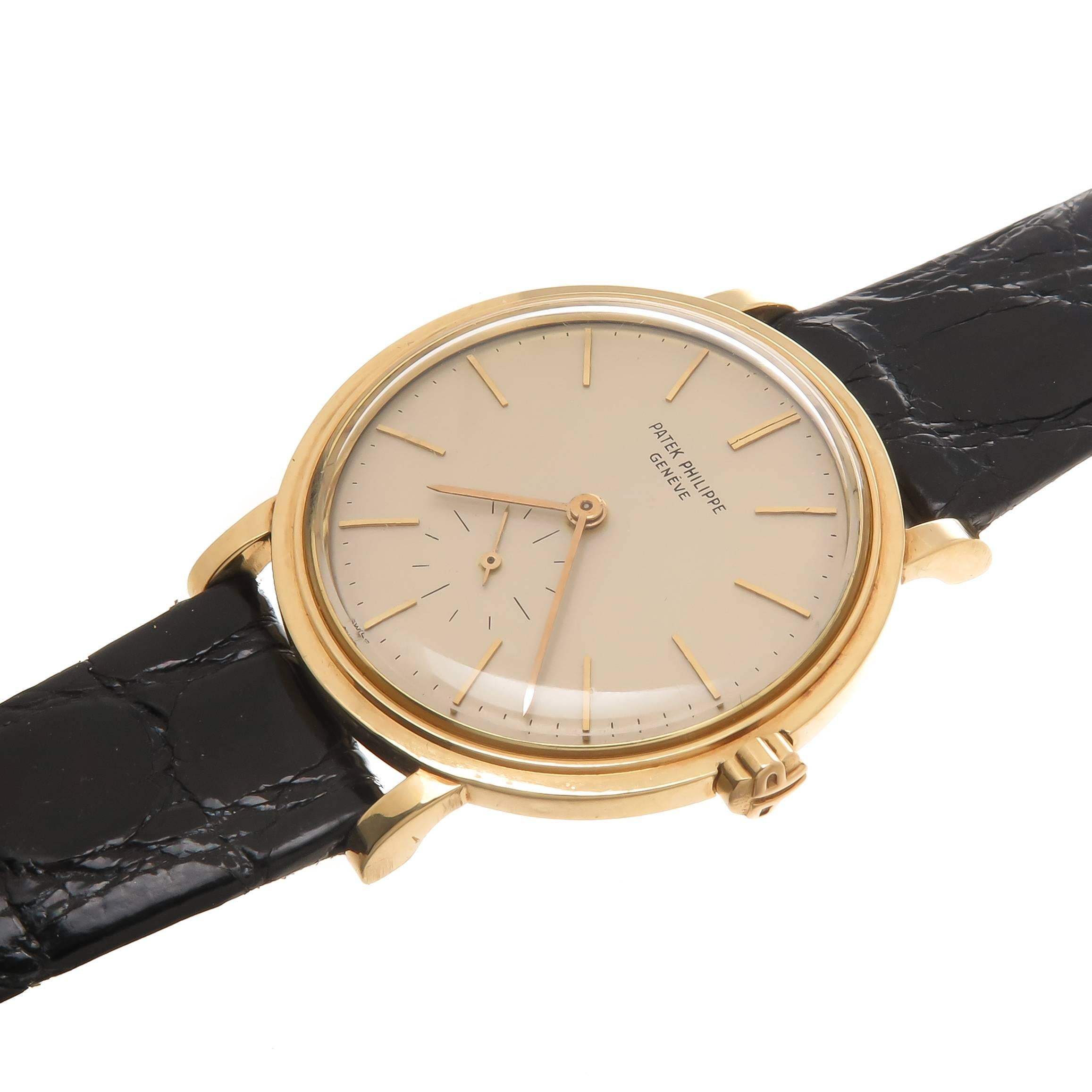 Circa 1960s Patek Philippe reference 3429 Calatrava gents wrist watch, 35 MM 2 piece, water proof case. Caliber 27-460 37 jewel Automatic, self winding movement with Gold Rotor. Matt Silver dial with raised Gold Markers that is original and in