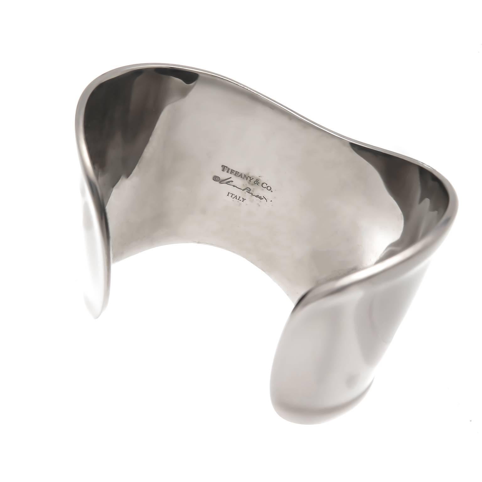 Circa 2014 Elsa Peretti for Tiffany & Company Ruthenium Bone Cuff Bracelet, medium size for the right wrist measuring 2 inch wide with an opening that measures 1 1/4 inch. Comes in original Tiffany Gift Box.