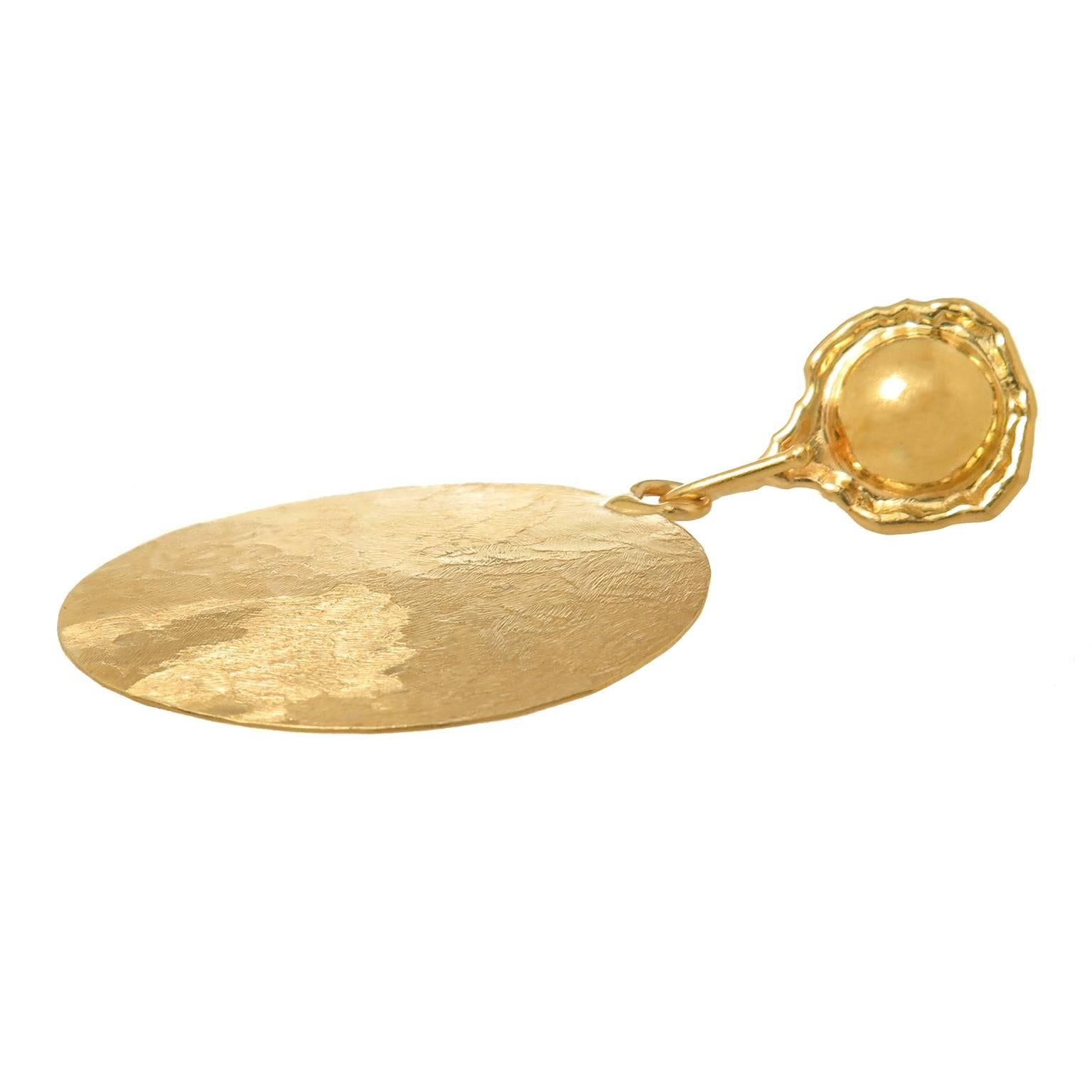 Circa 1990s Jean Mahie 18K yellow Gold Hand Hammered and textured Large Disk Earrings, the bottom round disks measure 1 5/8 inch with the top portion measuring 5/8 inch in diameter, total length of the earrings 2 5/8 inch. The disks are detachable