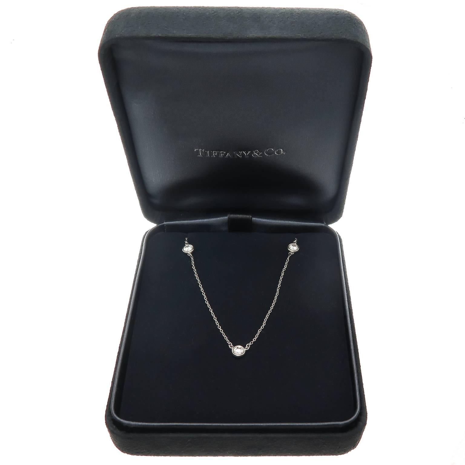 Circa 2005 Elsa Peretti for Tiffany & company Platinum, Diamonds by the Yard Collection Necklace, set with .20 carat Round Brilliant cut Diamonds totaling .60 Carat. Total necklace length 17 Inch. Comes in Original Tiffany Presentation Box.
