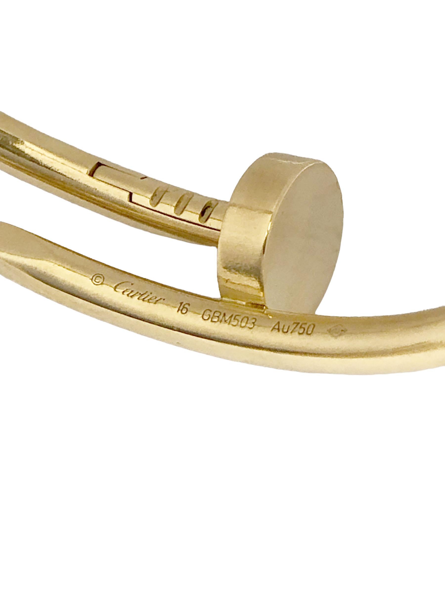 Circa 2014 Cartier Juste Un Clou 18K yellow Gold size 16 Nail Bracelet. Signed and Numbered and comes in original Cartier Suede travel pouch. 