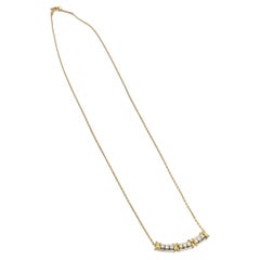 Collier Tiffany & Company Schlumberger en or et platine, serti de 16 diamants