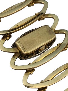 Vintage-Armbanduhr aus den 1960er Jahren mit breitem Armband aus Gelbgold und Diamanten von Spaulding &