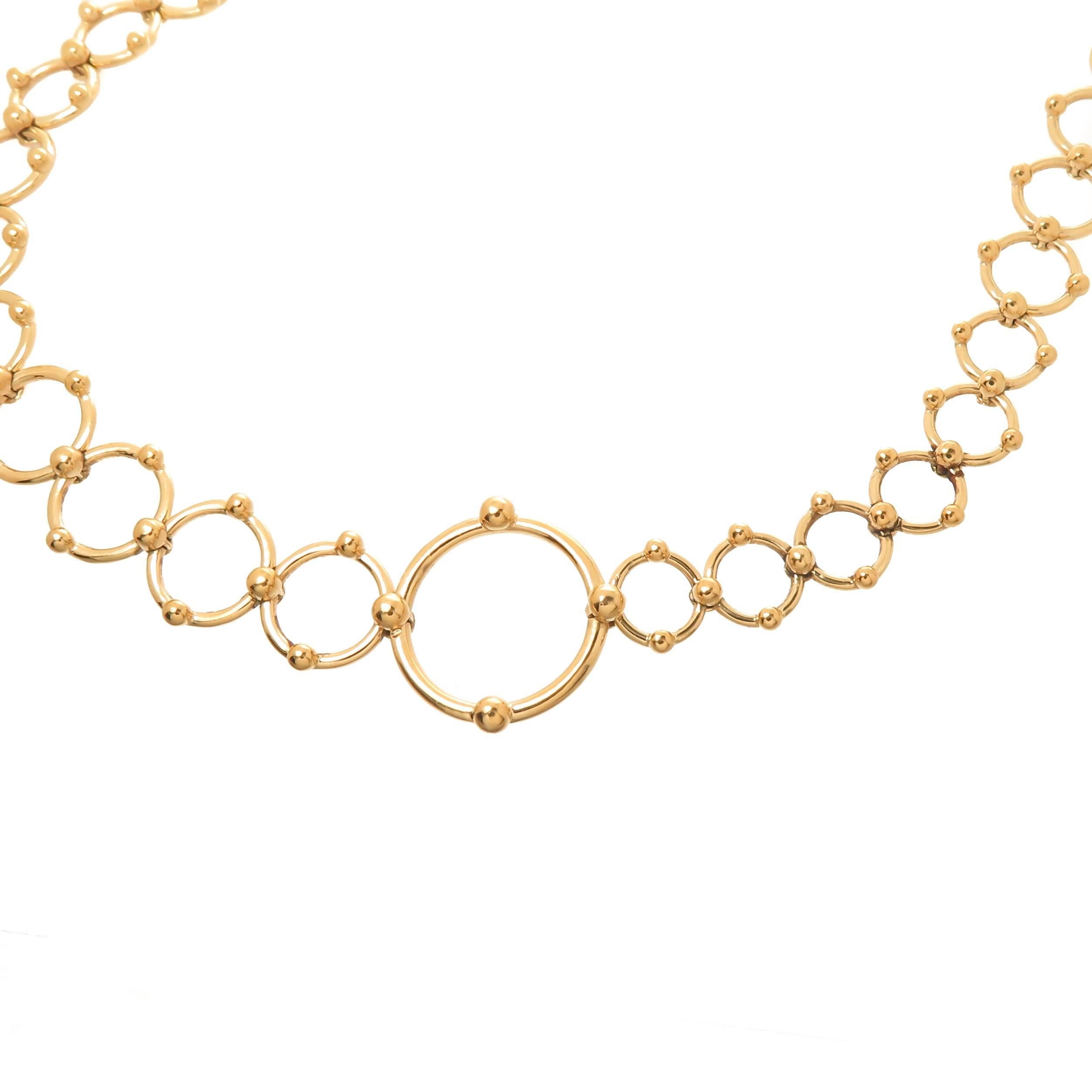 Circa 2005 Tiffany & Company 18k Yellow Gold Circles necklace, measuring 30 inches in length and weighing 61.3 Grams. Consisting of Sold Links in tapering sizes from 1/4 inch up to 5/8 inch. Signed on the Largest circle link. Comes in the original