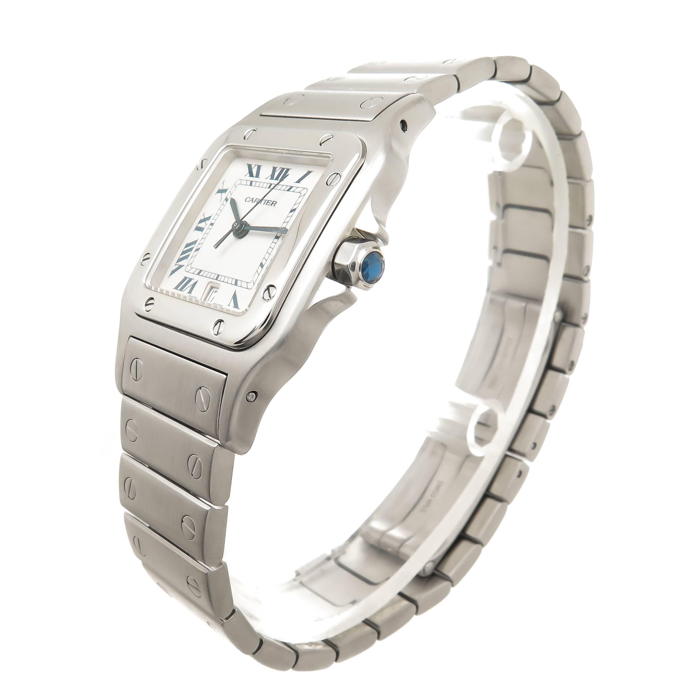 Circa 2000 Cartier Santos, 41 X 29 MM Stainless Steel water resistant case, Matt finish with high polished Bezel, Quartz Movement, White Dial with Black Roman Numerals, sweep seconds hand, Calendar window at the 6, scratch resistant crystal and a