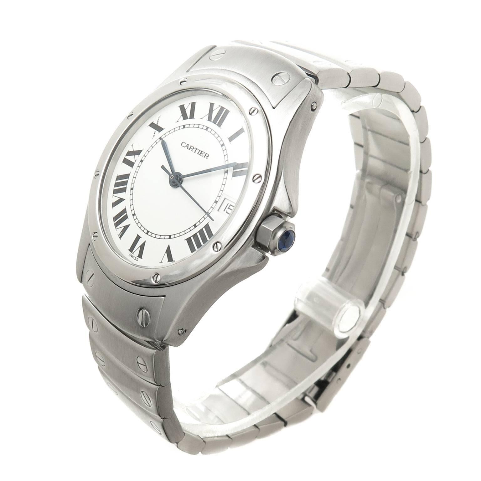 Circa 2000 Cartier Santos Wrist Watch, 33 MM water resistant case, Scratch resistant crystal, automatic, self winding movement with calendar window at the 3 position, sweep hand, White Dial with Black Roman Numerals, Sapphire Crown. 5/8 inch wide
