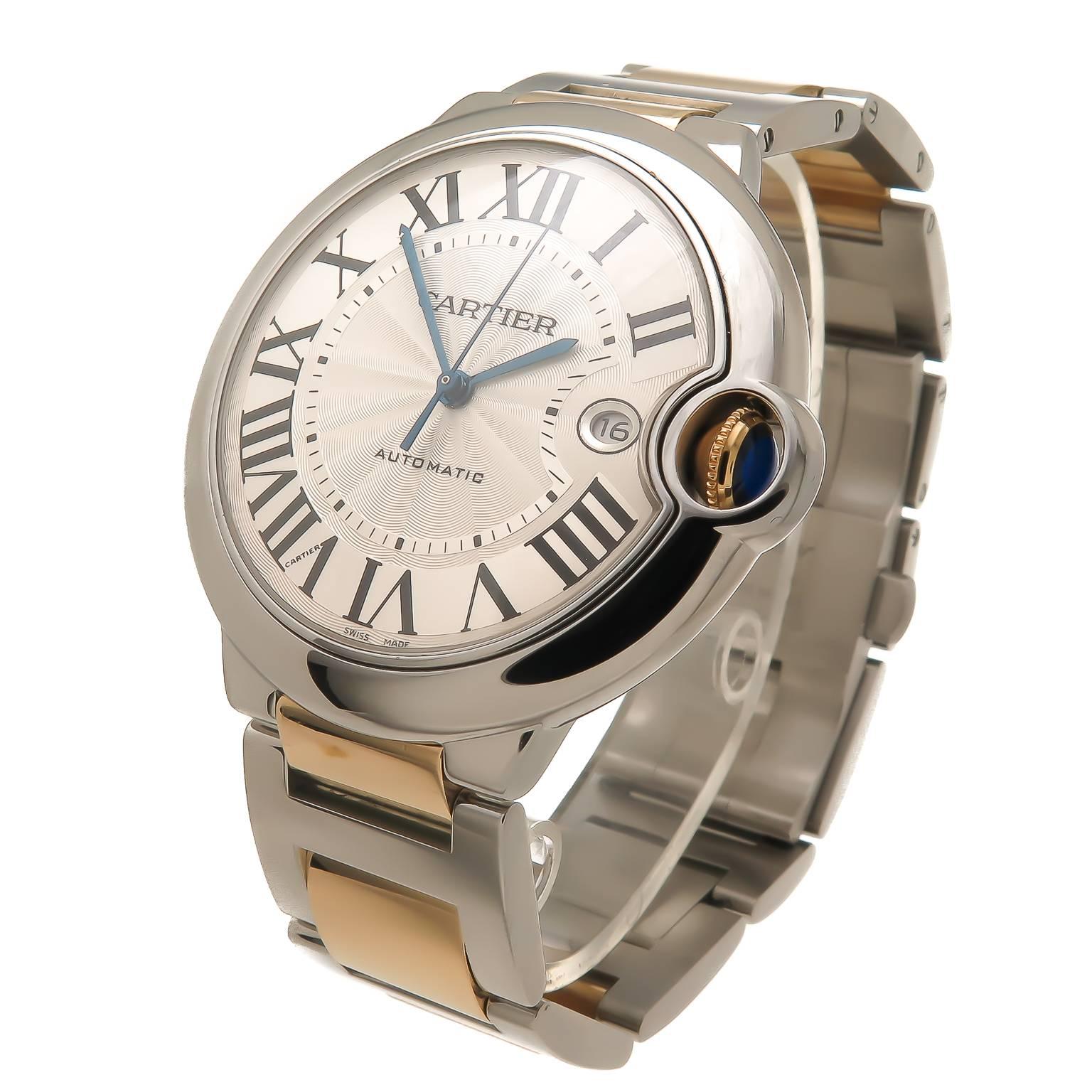 Circa 2013 Cartier Ballon Bleu 42MM XL 18K Yellow Gold and Stainless Steel Wrist Watch, water resistant case,scratch resistant crystal,Caliber 049 Automatic self winding movement, silvered engine turned Guilloche dial, Blue Spinel Crown. New, Never