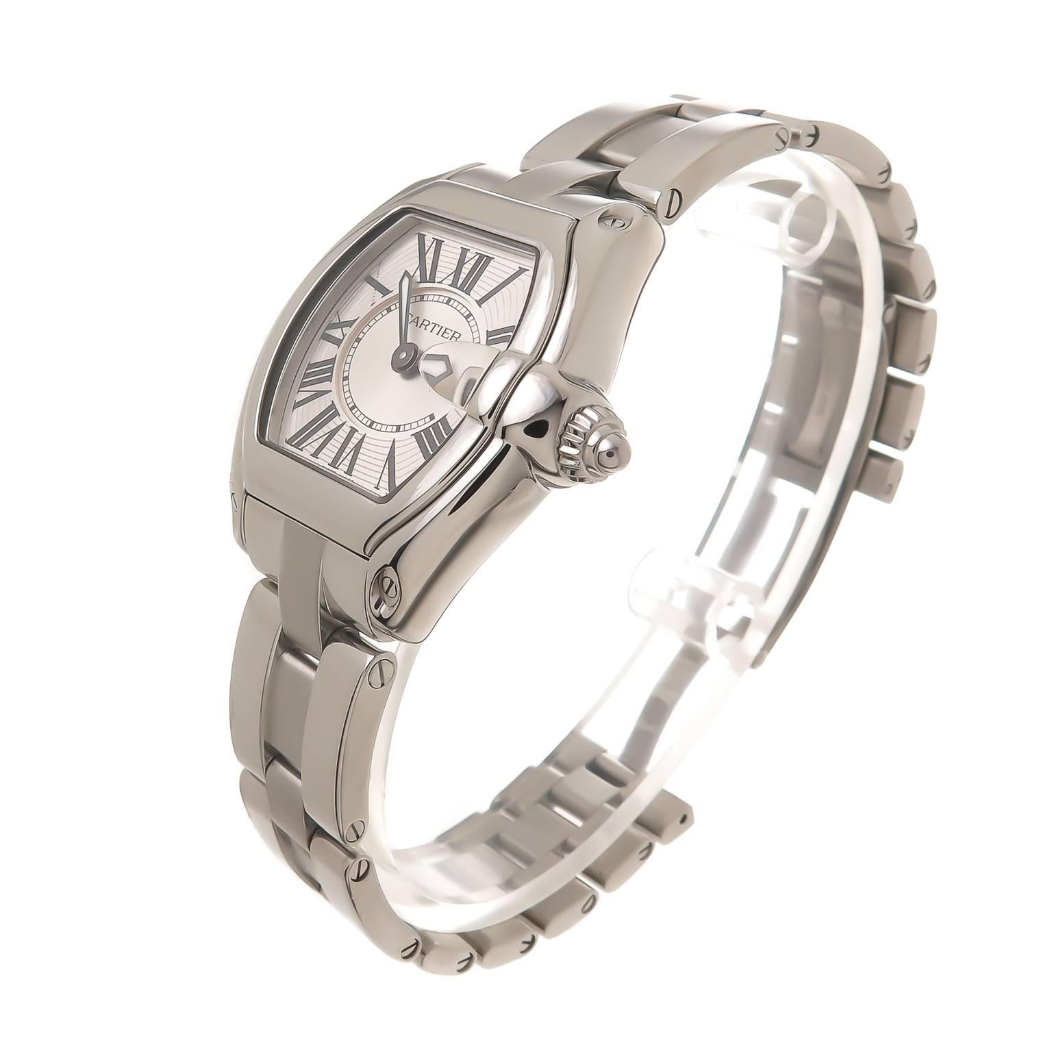 Circa 2013 Cartier Ladies Stainless Steel Roadster Wrist Watch. Ref 2675 31 X 37 MM Water Resistant Case. Quartz Movement, Silvered Guiloche engine turned dial with Black Roman numerals and date window at the 3 position. Scratch resistant crystal.