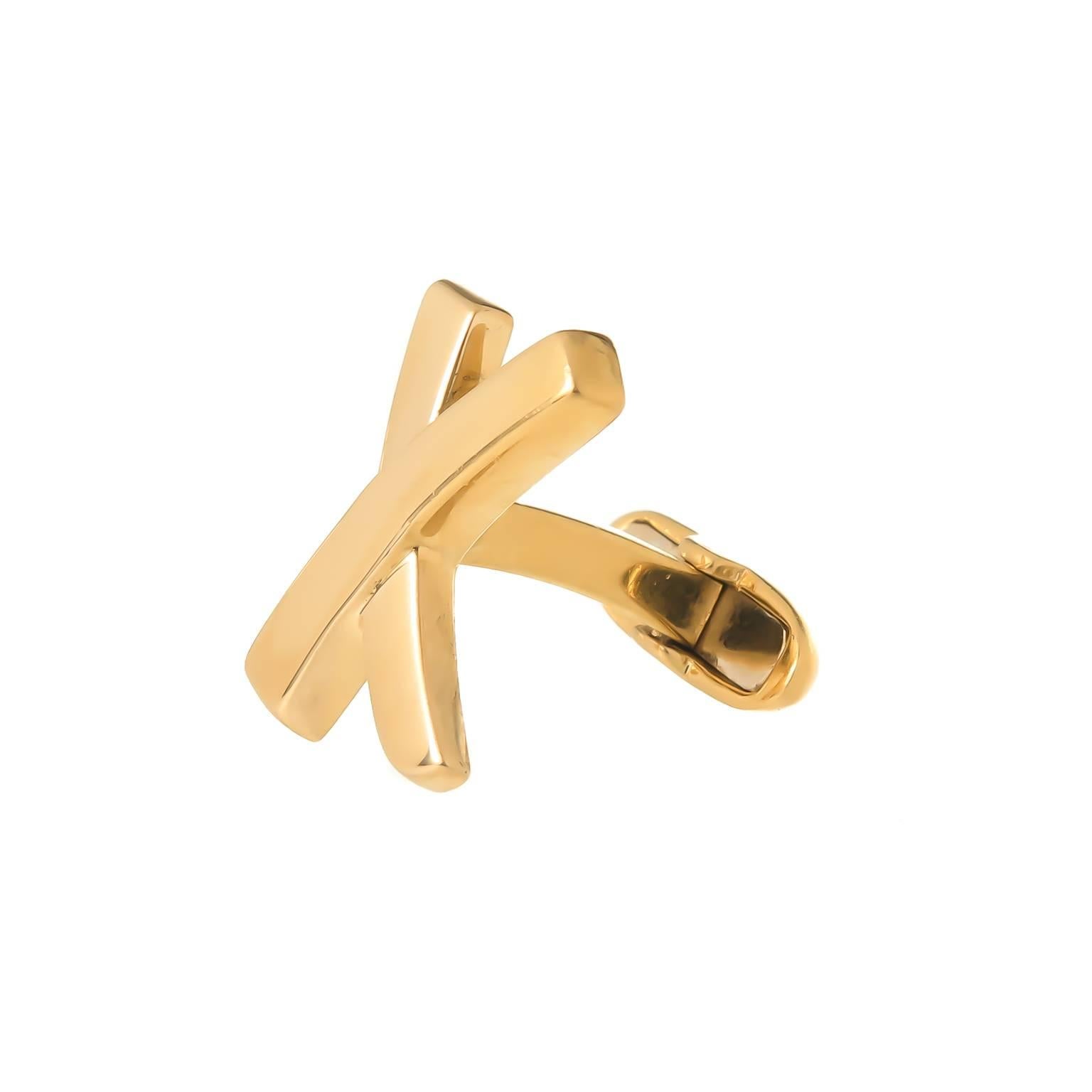 Circa 1990s Paloma Picasso for Tiffany & Company Classic X Cuff-links in 18K yellow Gold, measuring 5/8 inch. Signed and comes in the Original Tiffany Gift pouch.