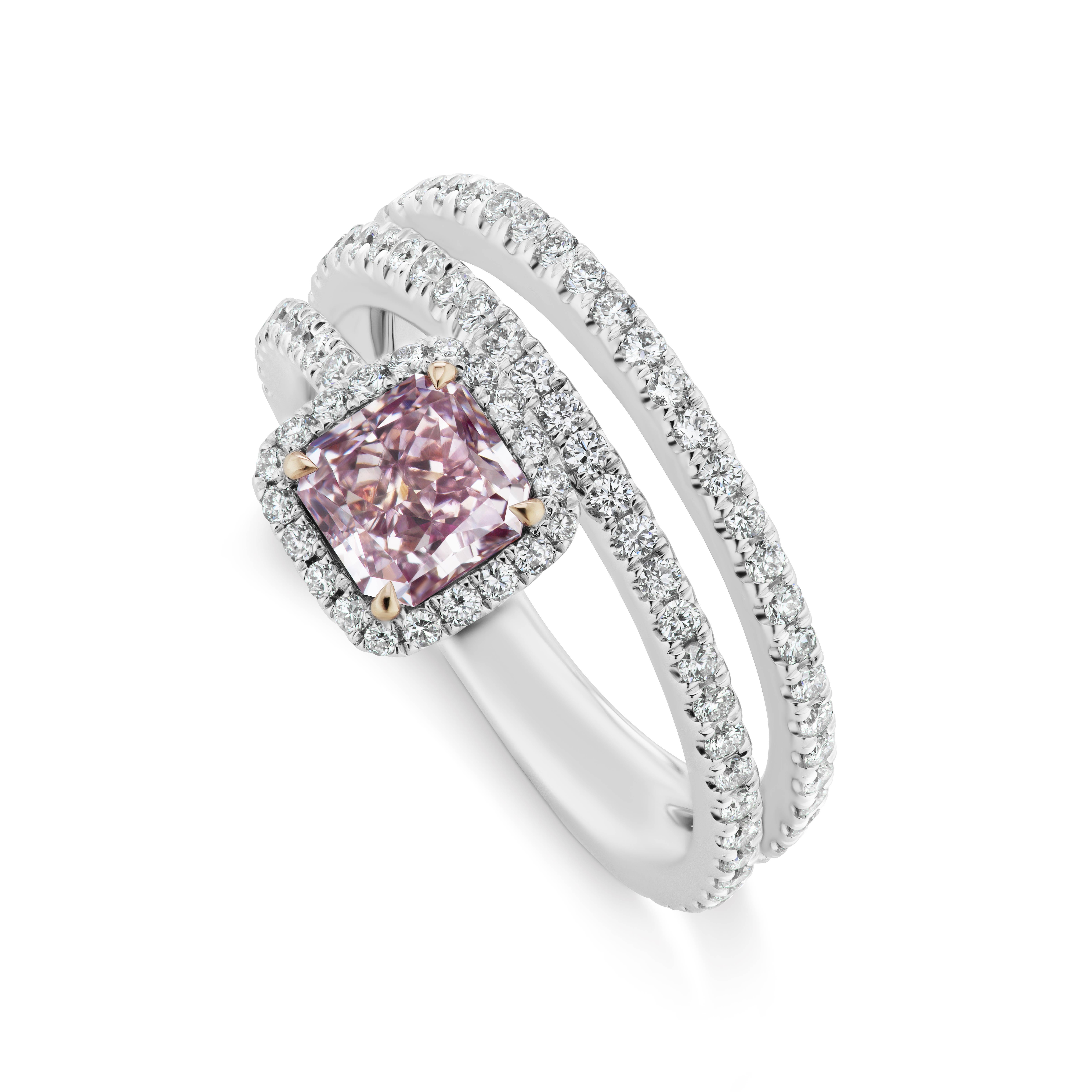 From Scarselli, the world-recognized collection of Natural Fancy Color Diamonds, this 1.01 Carat Radiant Cut Fancy Purple Pink SI1  clarity diamond is mounted with 96 small round diamonds for a  total 0.71 carats G VS1 quality in 18 karat White