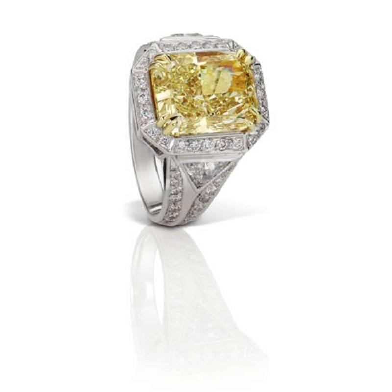 From Scarselli, this exceptional 6.35 Carat Fancy Yellow Radiant Cut Diamond is VS2 Clarity and set in Platinum with 18 karat Yellow Gold.  This diamond makes a powerful statement any time of the day and may be custom designed with this or a similar