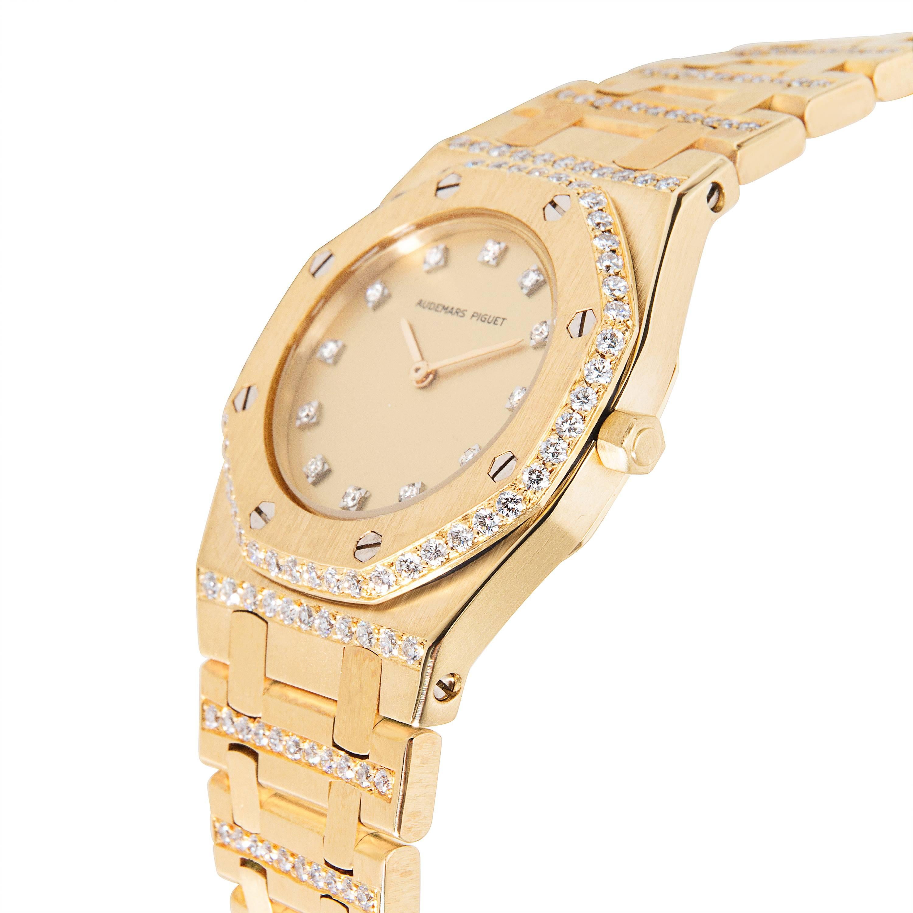 Audemars Piguet Royal Oak Ladies Watch in 18K Yellow Gold

This Audemars Piguet Royal Oak is a unique and eye catching timepiece of the 1980s. It features 2.35 carats of high quality diamonds, D-F in color and VS in clarity. The diamonds are factory