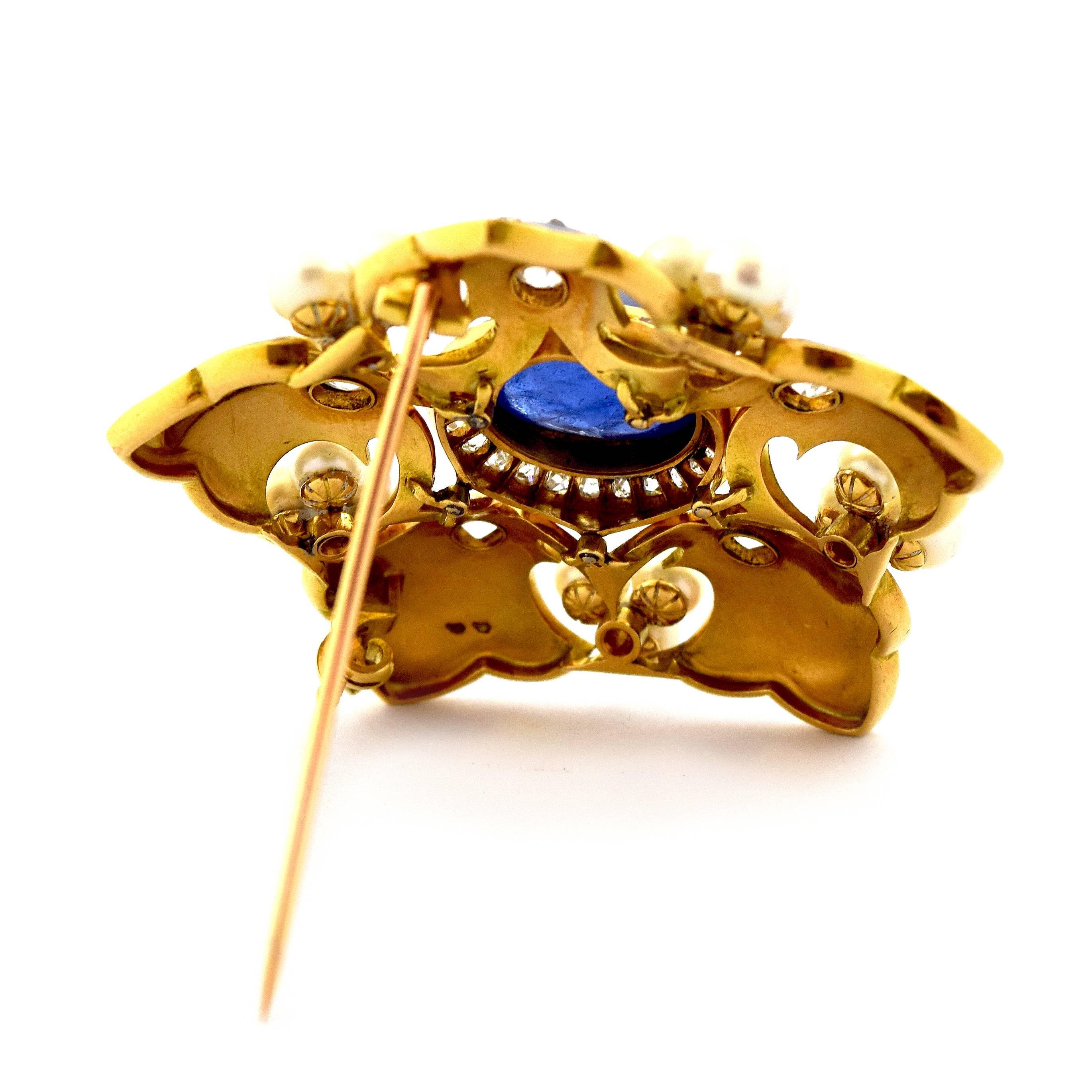 Vintage French 18k Yellow Gold  French hallmarked  
Blue Enamel, pearls and Old European cut diamonds to create this beautiful creation 
Pin Brooch.
4 old cushion-cut diamonds approximately 0.20ct each.
15 white pearls.
6 small old cut