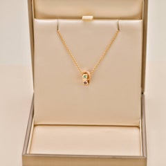 Collar con colgante «Roman Sorbet» de Bvlgari, con zafiro y tsavorita, en oro rosa de 18 quilates