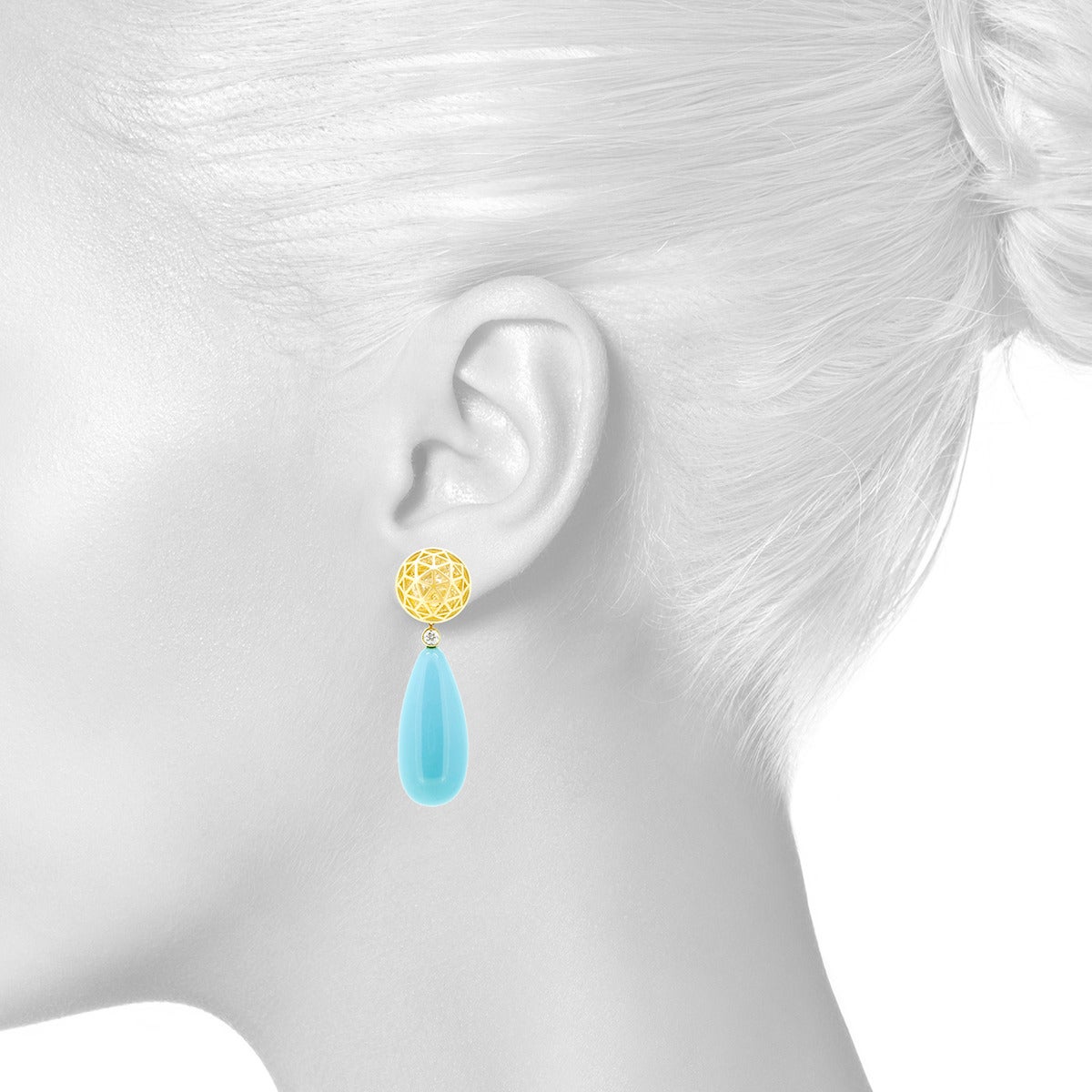 From the Wired Collection, drop earrings in 18k yellow gold with 6 cts of loose yellow sapphires, bezel-set white diamond spacers (0.07 ct), and 37 ct Sleeping Beauty turquoise teardrops. Satin finish with polished highlights. Geodesic pattern. On