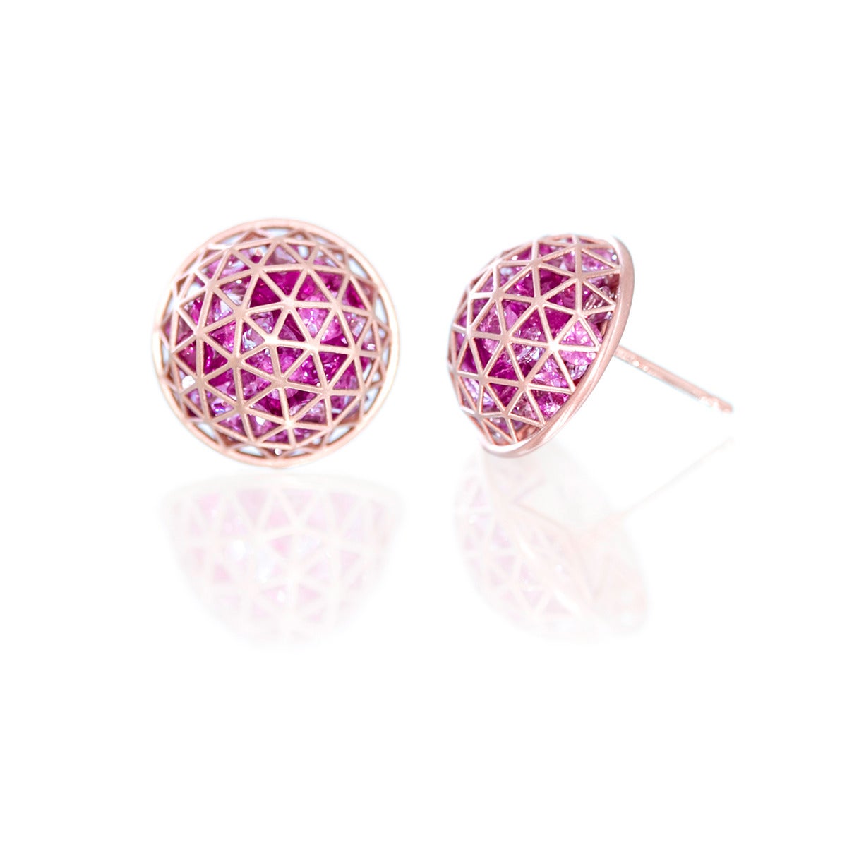 From the Wired Collection, a pair of 18k rose gold earrings with loose pink sapphires (17 cts). Geodesic pattern, on posts. Diameter 16mm or approx 5/8