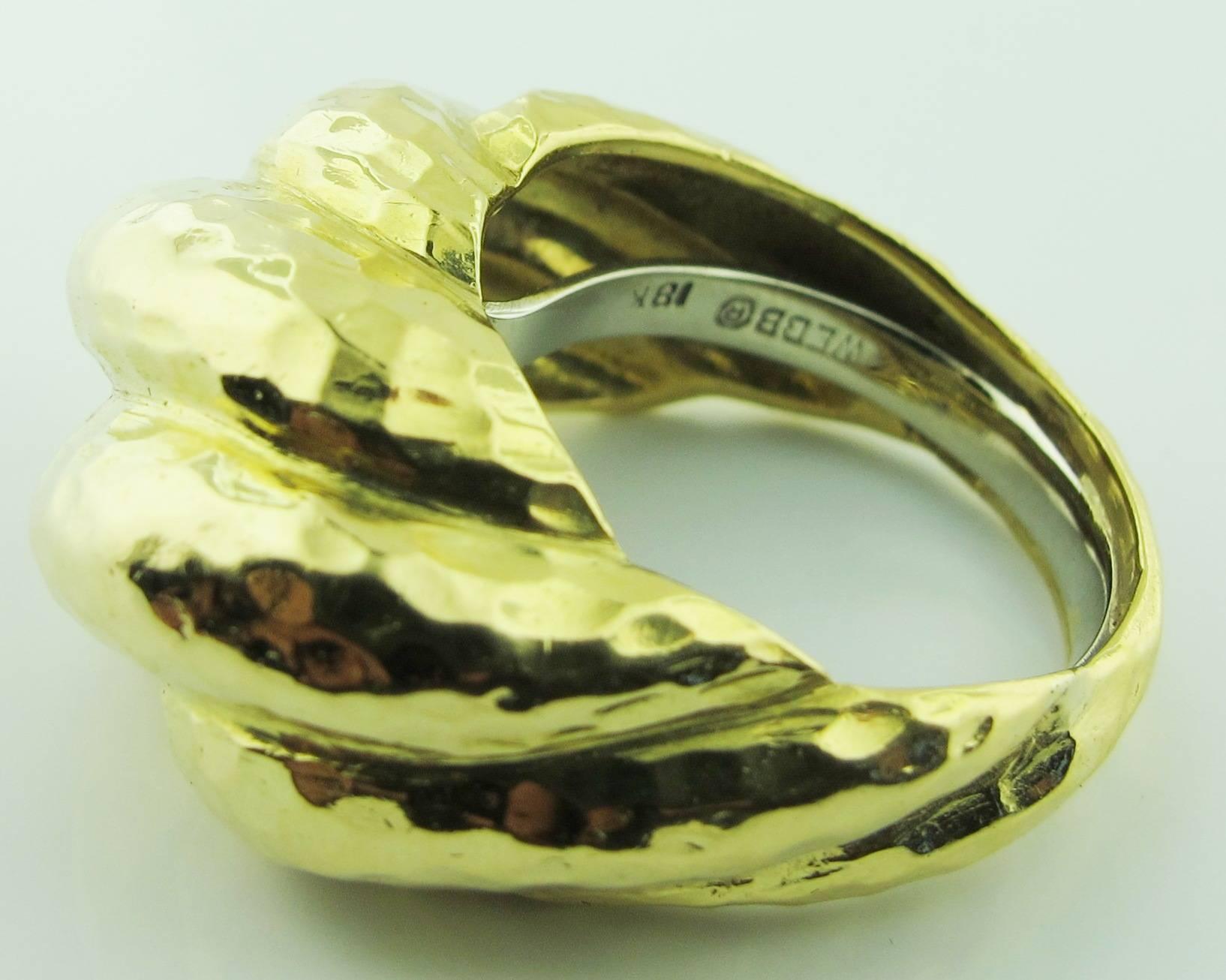 David Webb hammered 18 karat yellow gold ladies ring in fluted pattern.  14 grams.  Finger size 7 3/4 - can be sized. Signed Webb.   