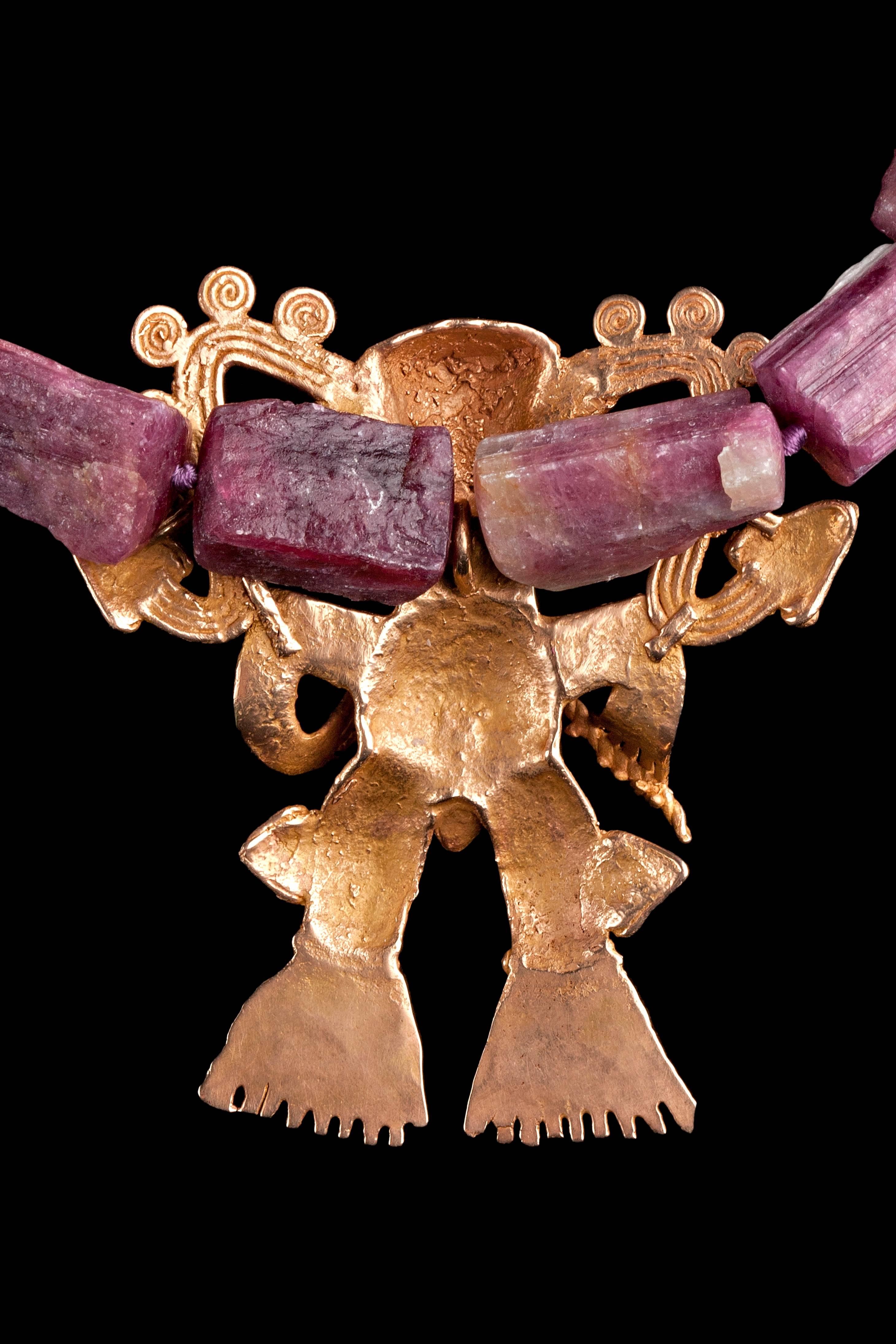 Natural pink tourmaline necklace (167 gms) with rare gold Veraguas/Diquis supernatural drummer Ca. 700 to 1400 AD. Very fine example of ancient, Precolumbian goldwork form Central America, either Costa Rica or Panama. 111 grams of blush pink gold