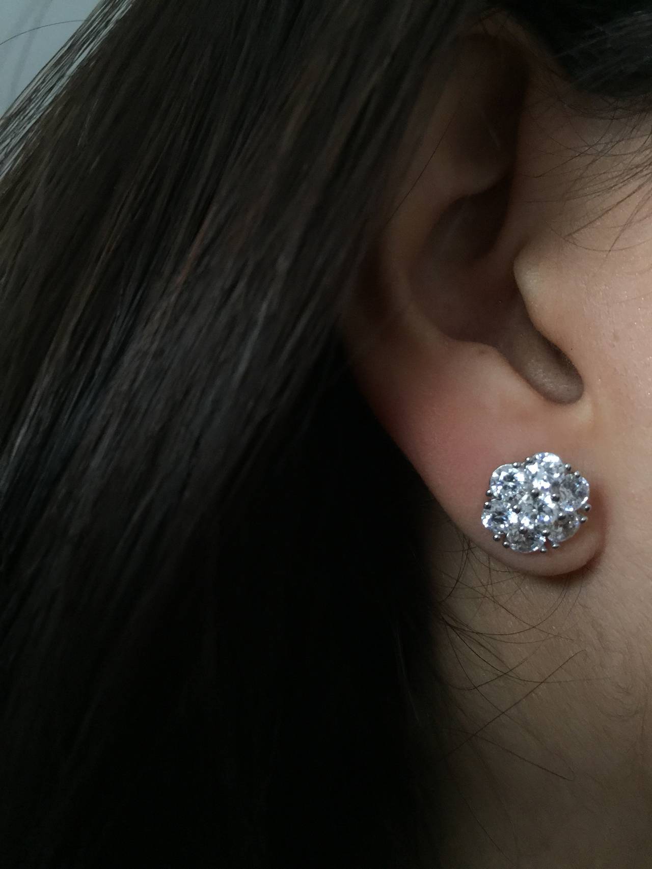 Colorless/VVS Clarity Diamonds. 
These cluster diamond earrings were designed and manufactured by Emilio!