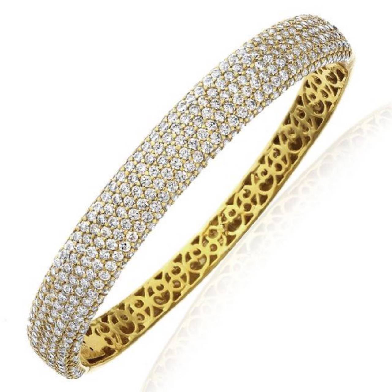 This bangle features our special extra safe push lock, and opens so it can easily be put on the wrist. 

384 Round colorless white diamonds VS clarity have been extra carefully micro pave set, one by one. One can only imagine how much time our