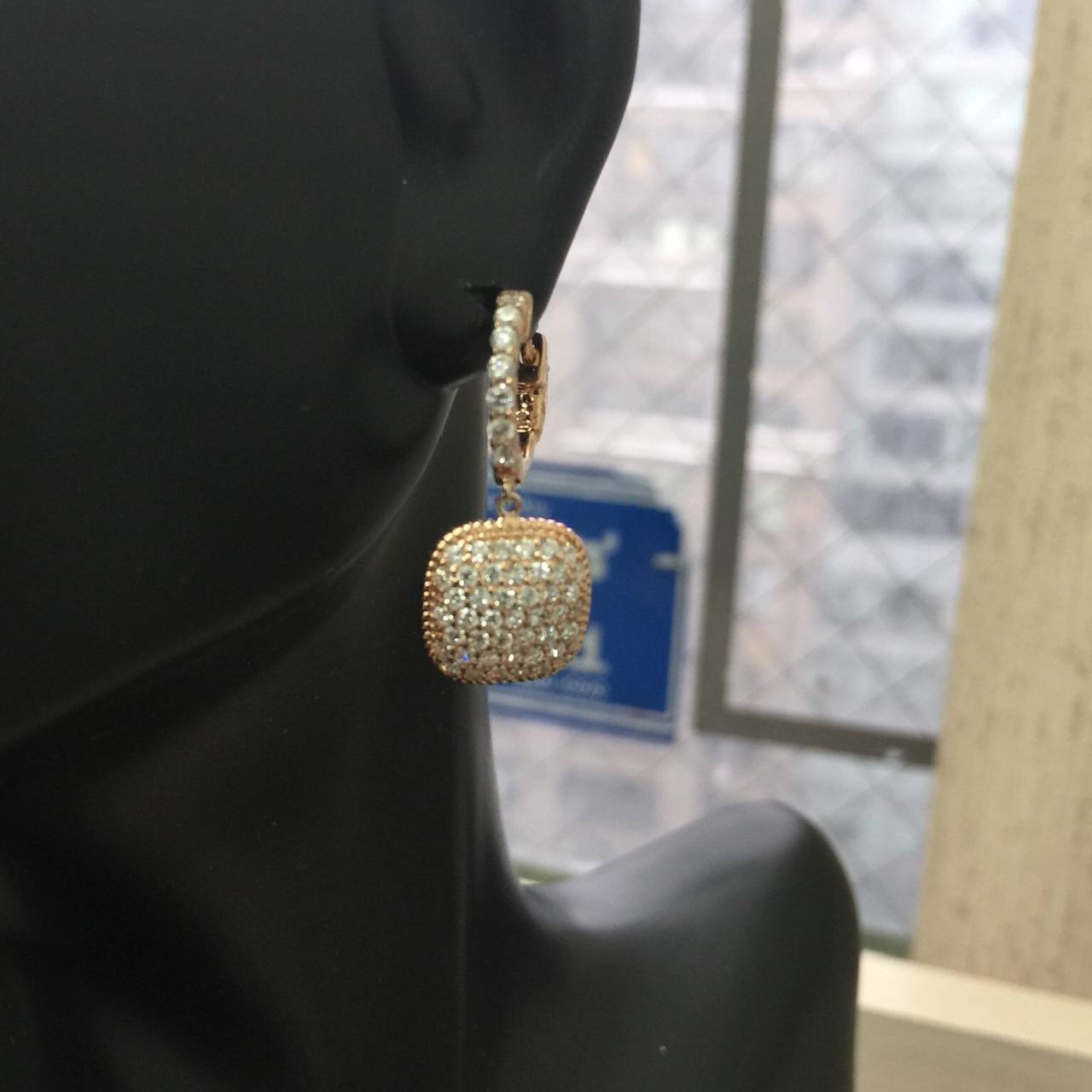 104 round diamonds micro pave set to create this gorgeous, simple, elegant earring. Al different gold color options available. 18k also available. This earring features our secure push lock mechanism. Colorless/VS clarity diamonds used.