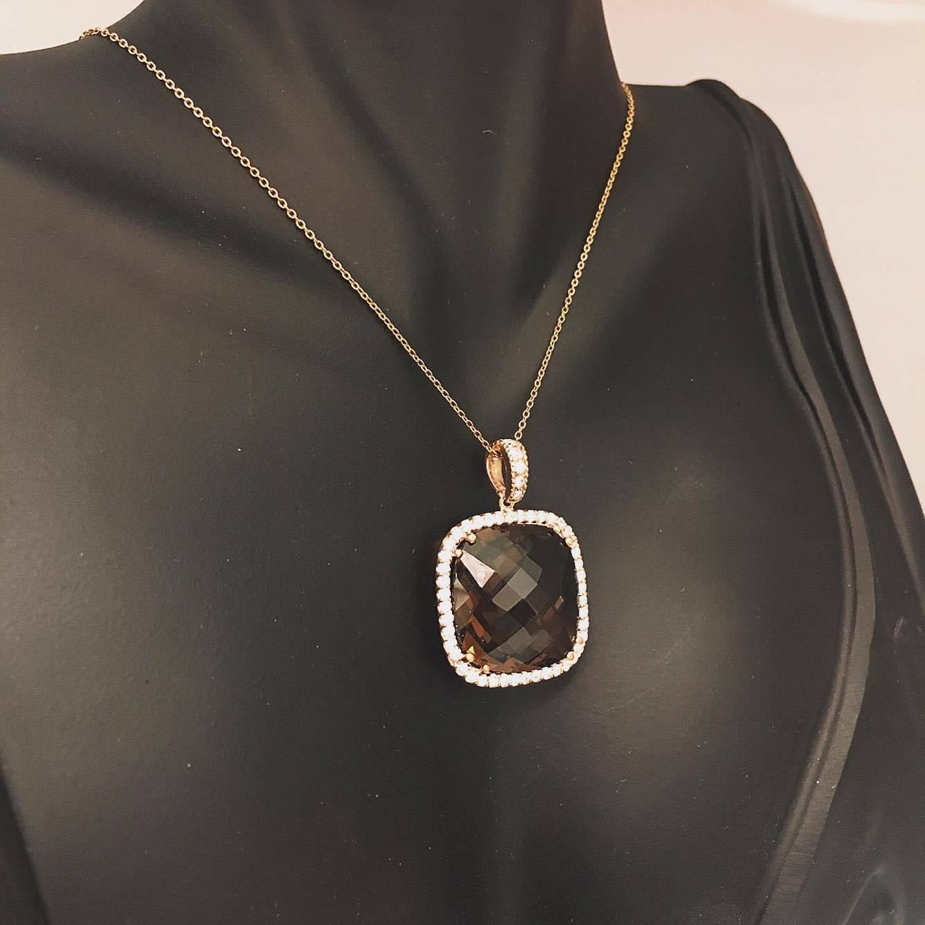 20.00ct Smokey Quartz Center 18x18mm cushion and approx. 0.8 carats total weight diamonds. (Standard length is 17 inch- 18 inch, however any length is avaliablet). Can be ordered in 14k or 18k white/yellow/rose gold as well.  

Color: F  Clarity: