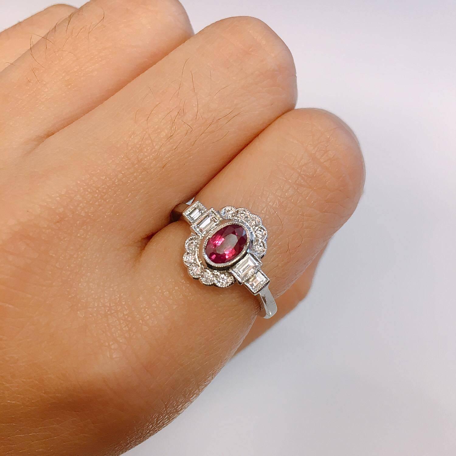 Stunning hand made ring with Emerald cut side stones! 
Diamond Color: E-F
Diamond Clarity: Vvs 
Cut: Excellent 
Size 7 and we can resize this ring so it is ready to wear no charge! 
All Emilio! pieces come with a professional appraisal from GAL, a