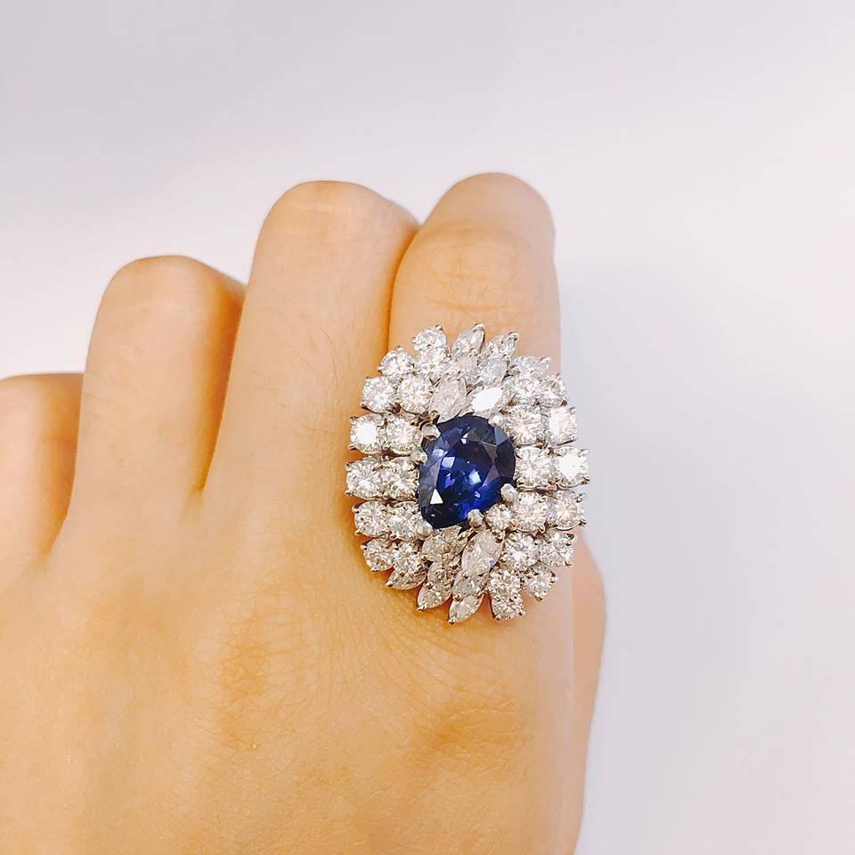 Diamond Color: E-F
Diamond Clarity: Vs 
Cut: Excellent 
Approximate Total weight 8.00cts 
Sapphire quality: Rich blue 
Please tell us your ring size and we will alter this ring so it is ready to wear once it arrives at no additional cost! 

All