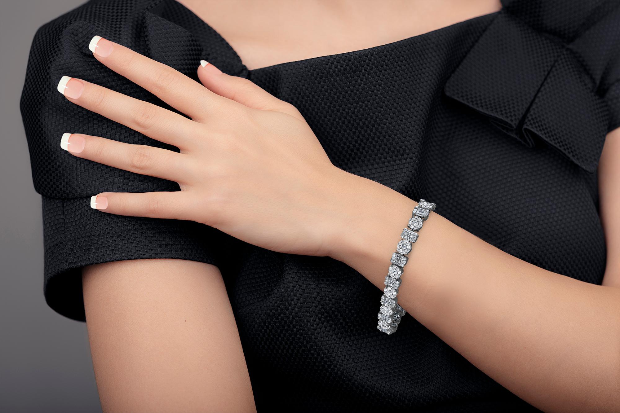 This striking diamond bracelet gives the impression of a much larger piece! 
Color: E-F
Clarity: Vs2 
Metal: !8kw
Length: 7 inches can be shorter or long by request 
For your piece of mind we are a proud Top Selling dealer on 1stdibs with 5 Star