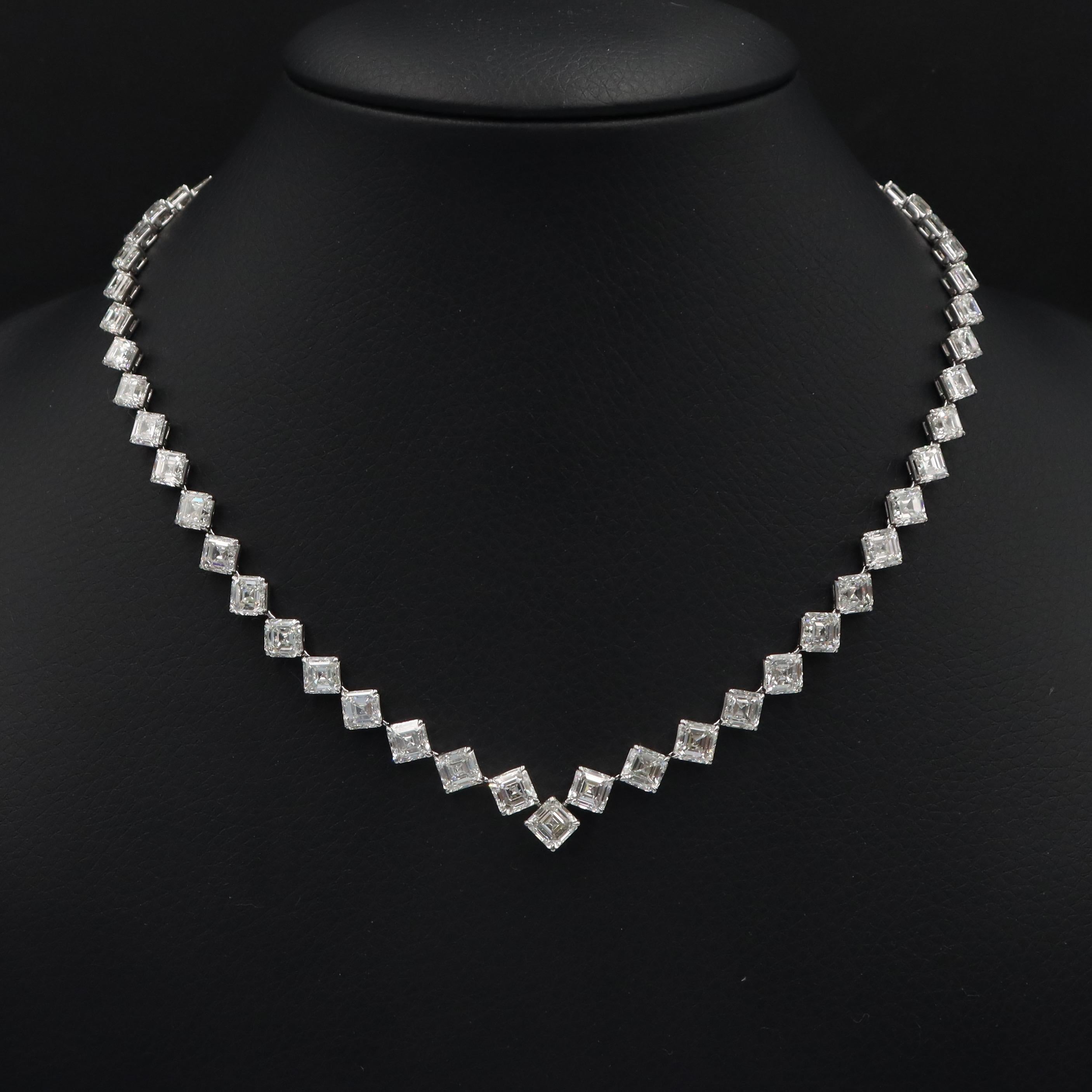 From Emilio Jewelry, a well known and respected wholesaler/dealer located on New York’s iconic Fifth Avenue, 
Featuring a custom hand made necklace that sits perfectly! Every single Asscher Cut diamond is Gia certified natural. The diamonds are 1.00