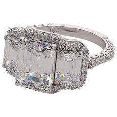 6.00 Carat Emerald Cut Three Stone Diamond Platinum Halo Ring
