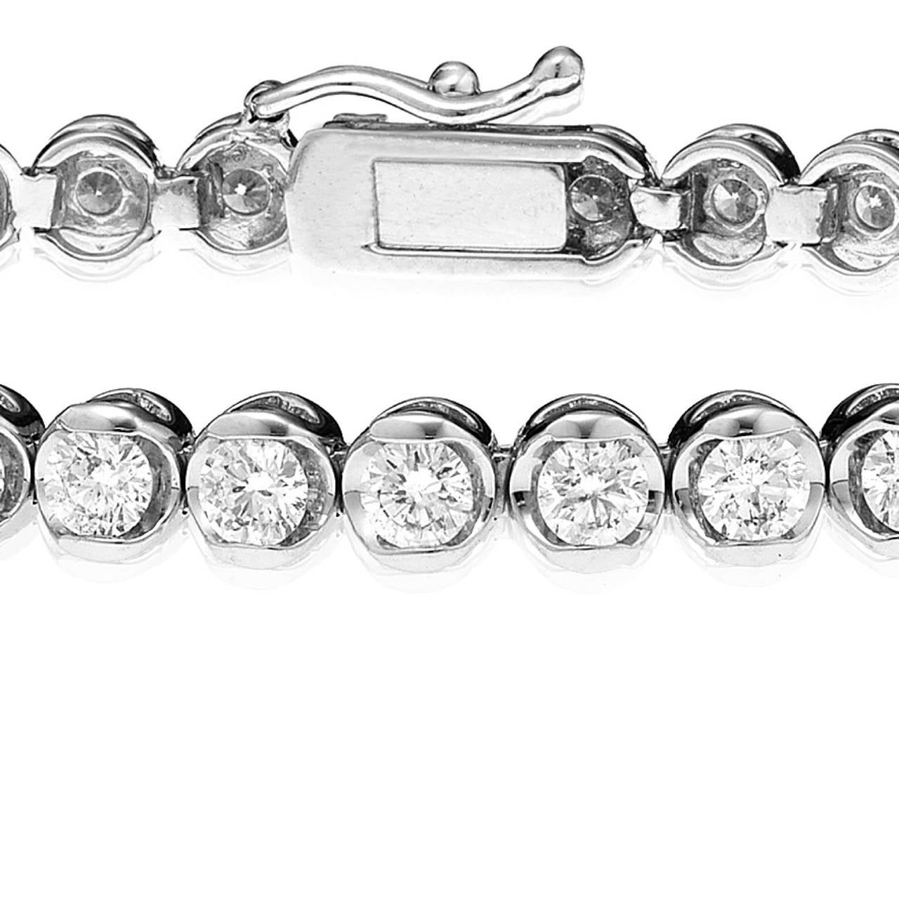 This Bracelet was designed and manufactured by Emilio! Each diamond was carefully hand set with a microscope by our skilled craftsman. 
The diamond quality are bright fine colorless diamonds/VS quality.
