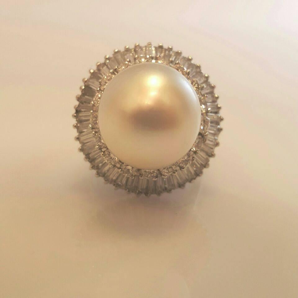 1 South Sea Pearl= 12.5mm
Dia= Appx. 2.50ct t.w. VVs clarity F color conflict free, natural white diamonds.
