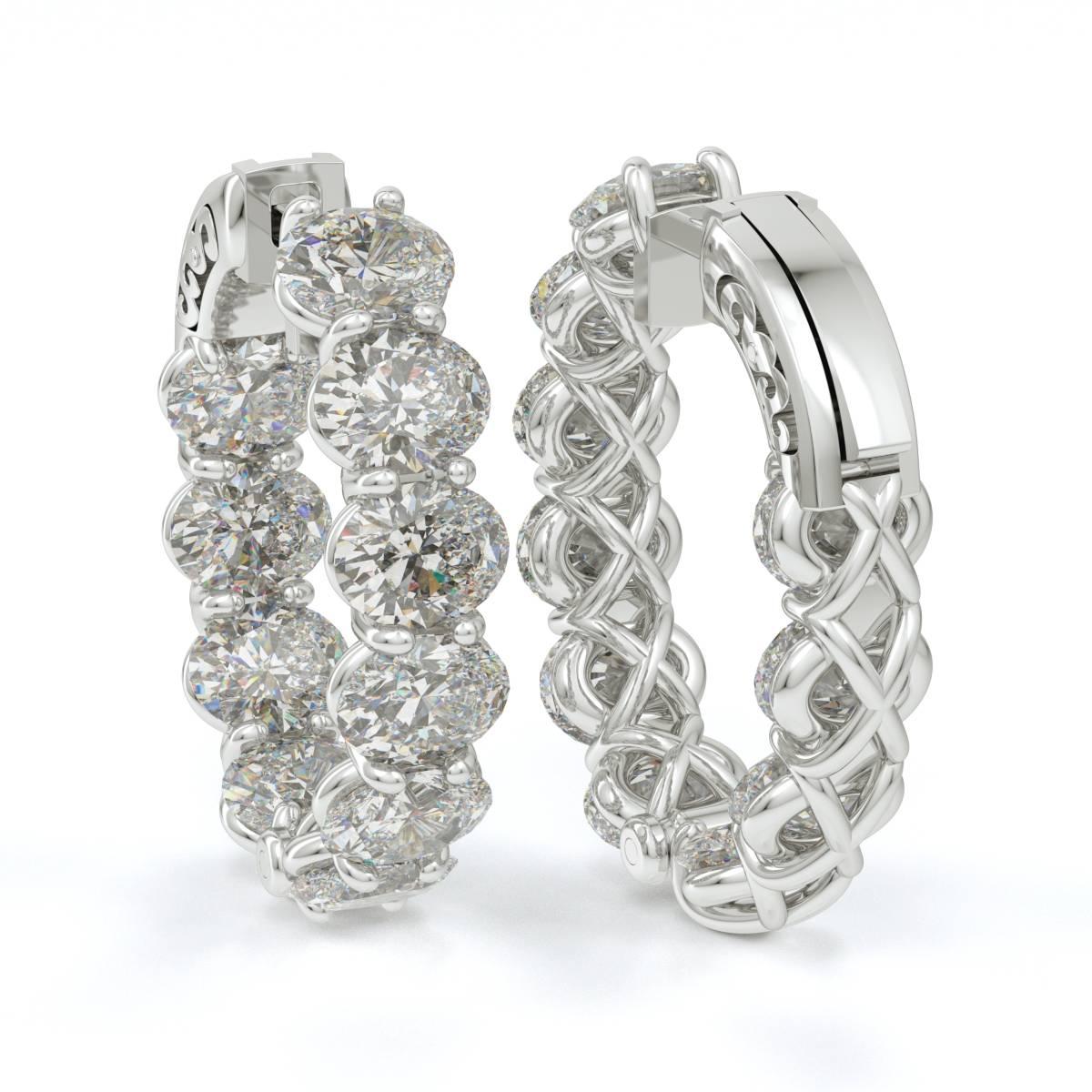 Emilio! Well known in the jewelry industry for having the largest selection of diamond hoops has created a unique hoop! We made these hoops perfect for the everyday woman that wants to show her elegance. The measurements are just 
Top to Bottom: