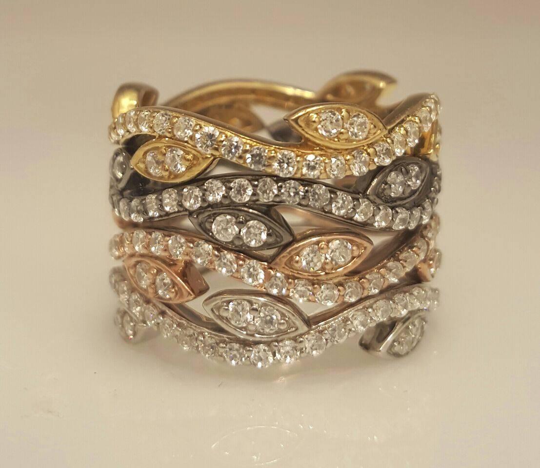 2.64ct t.w.(0.66ct t.w. for each ring) F color VVs clarity conflict free diamonds. There are 4 rings together but available to order separately each ring as well. Available in all sizes and gold color. These unique eternity rings stack flush into