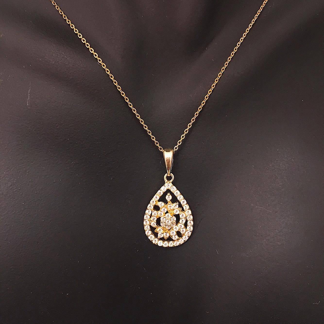 
.60ct t.w. Diamond VVs Clarity F color conflict free diamonds. If you prefer this piece in all white/yellow/rose gold and blackened gold, you can order it that way as well. Chain lengths up to 24 inch is available. 

For your piece of mind, we hand