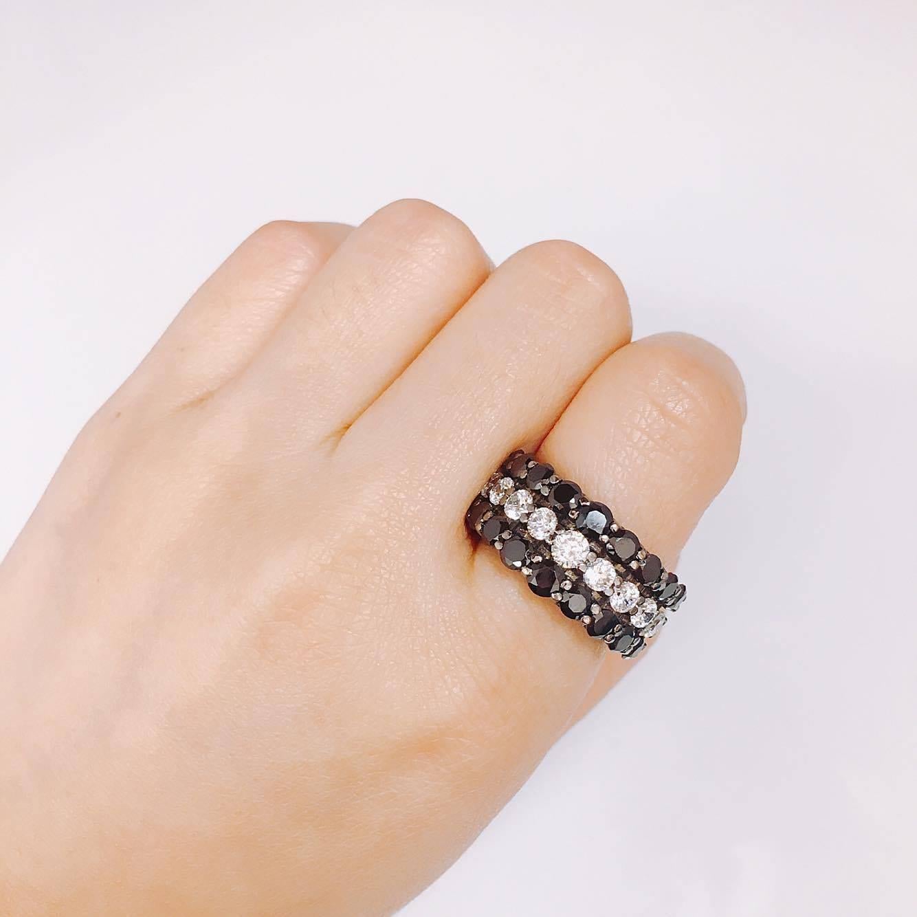 Very unique striking ring created in our own handmade factory! This ring can be ordered in 18k white gold if the black rhodium is not your taste. All sizes available. 