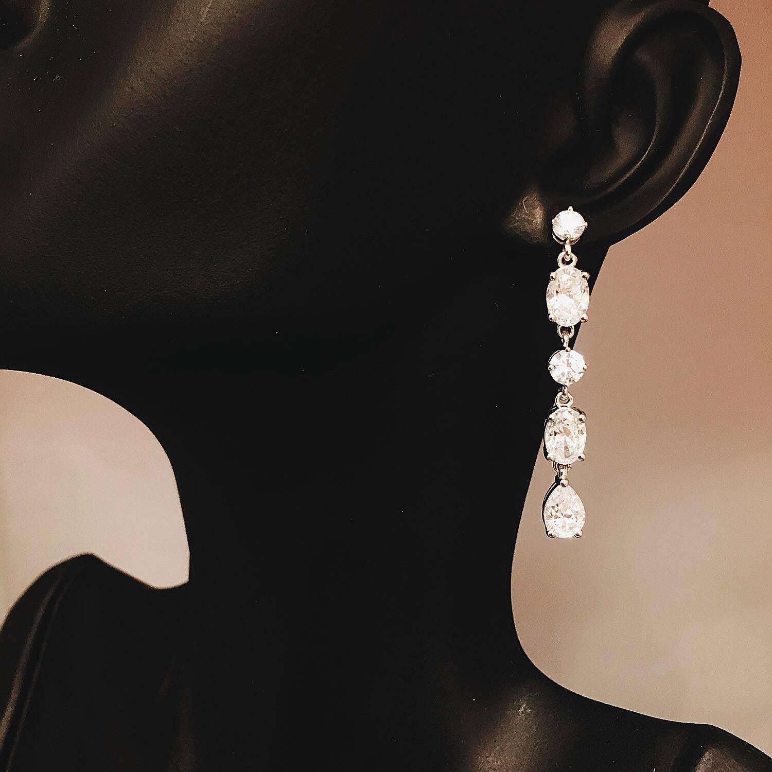 Women's Oval and Pear Shape Dangling Red Carpet Diamond Earrings
